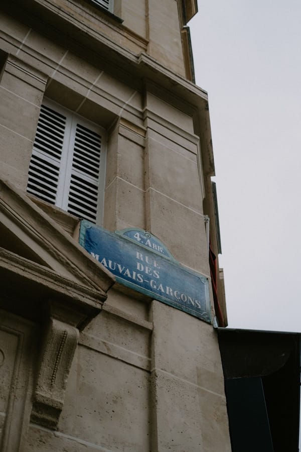 Stone apartment facade on a Parisian street