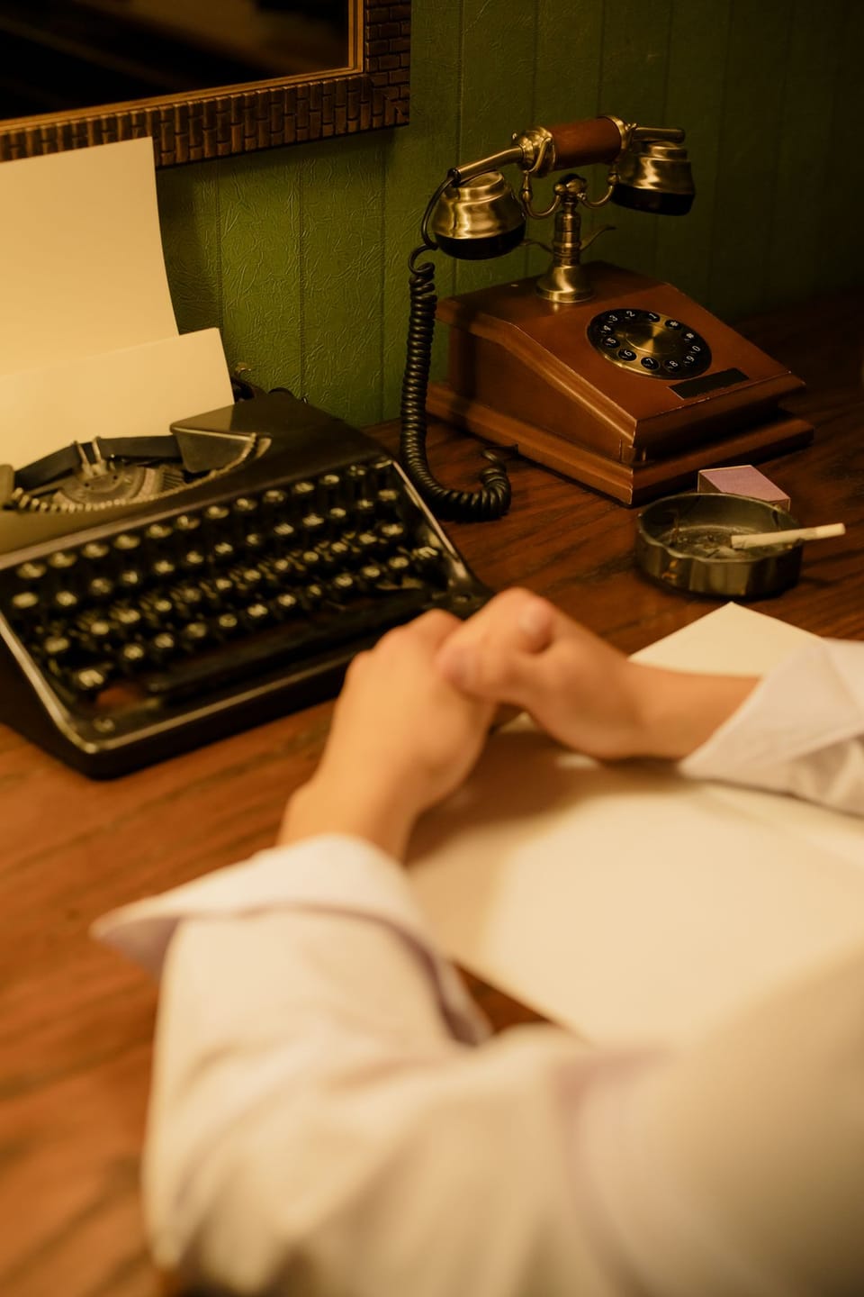 Retro office scene with typewriter and rotary phone